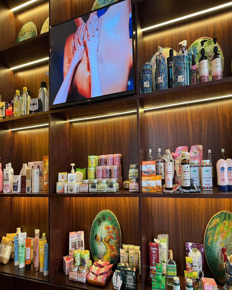 Shelves at Kiasu Spa displaying a wide selection of high-quality spa and beauty products for sale.